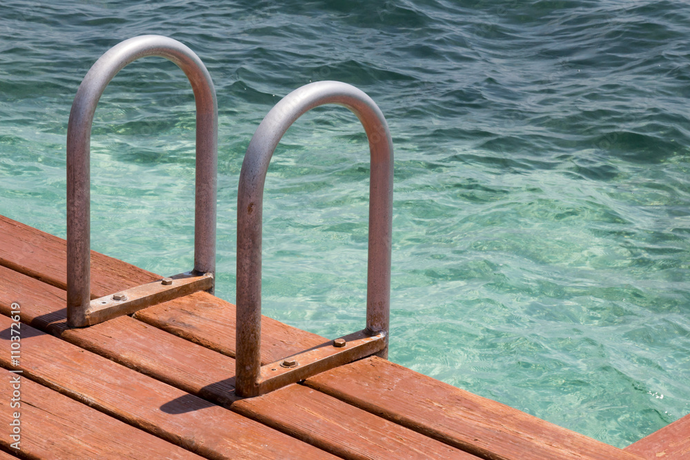 Dock stairs into the Caribbean in Belize Dock stairs into the Caribbean in Belize