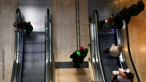 Wallpaper Mural STOCKHOLM, SWEDEN, APR 2016: High angel top view of crowd of people going up and down on a escalator Torontodigital.ca