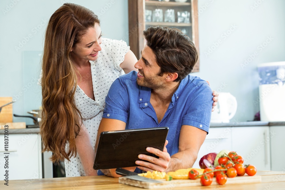 Happy young couple with digital tablet Happy young couple with digital tablet