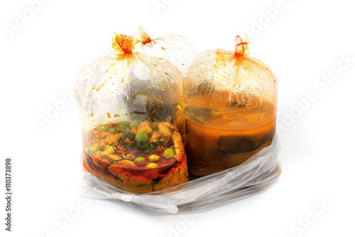 hot food in plastic bags in clear plastic container