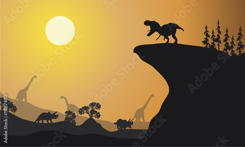 Silhouette of brachiosaurus and ankylosaurus
