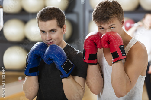 Confident Young Men Boxing In Gym © Tyler Olson