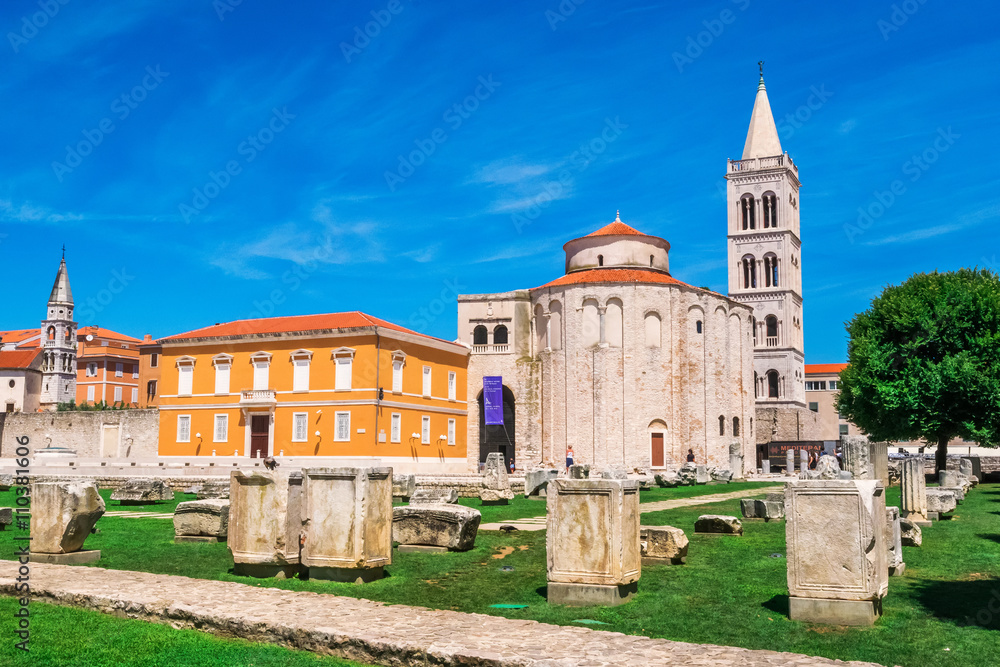 Church of st. Donat, a monumental building from the 9th century with historic roman artefacts in foreground in Zadar, Croatia Church of st. Donat, a monumental building from the 9th century with historic roman artefacts in foreground in Zadar, Croatia