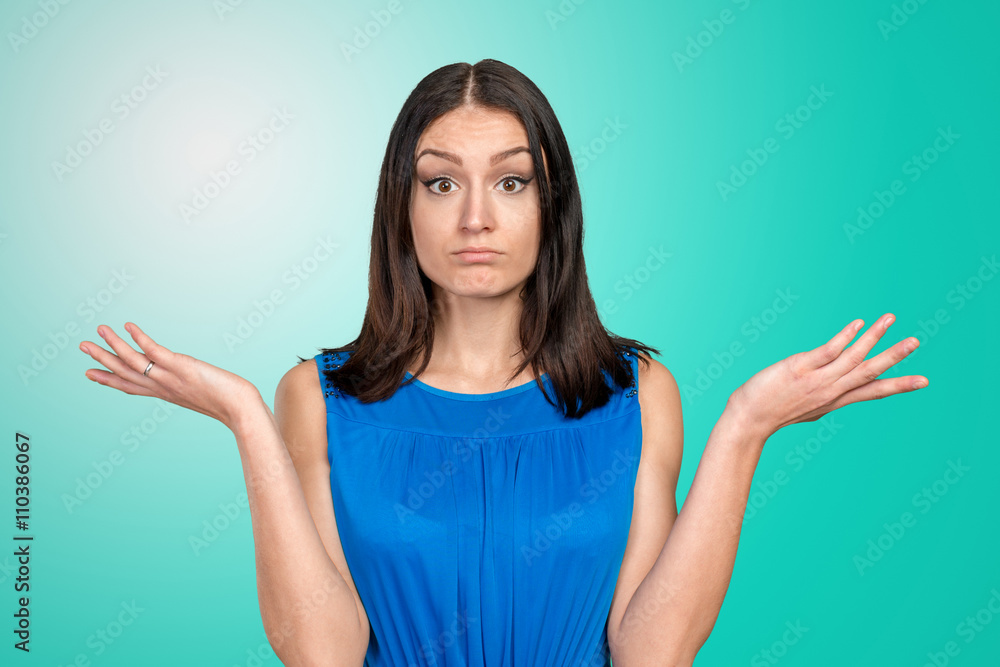 Unhappy young woman with questionable gesture Unhappy young woman with questionable gesture