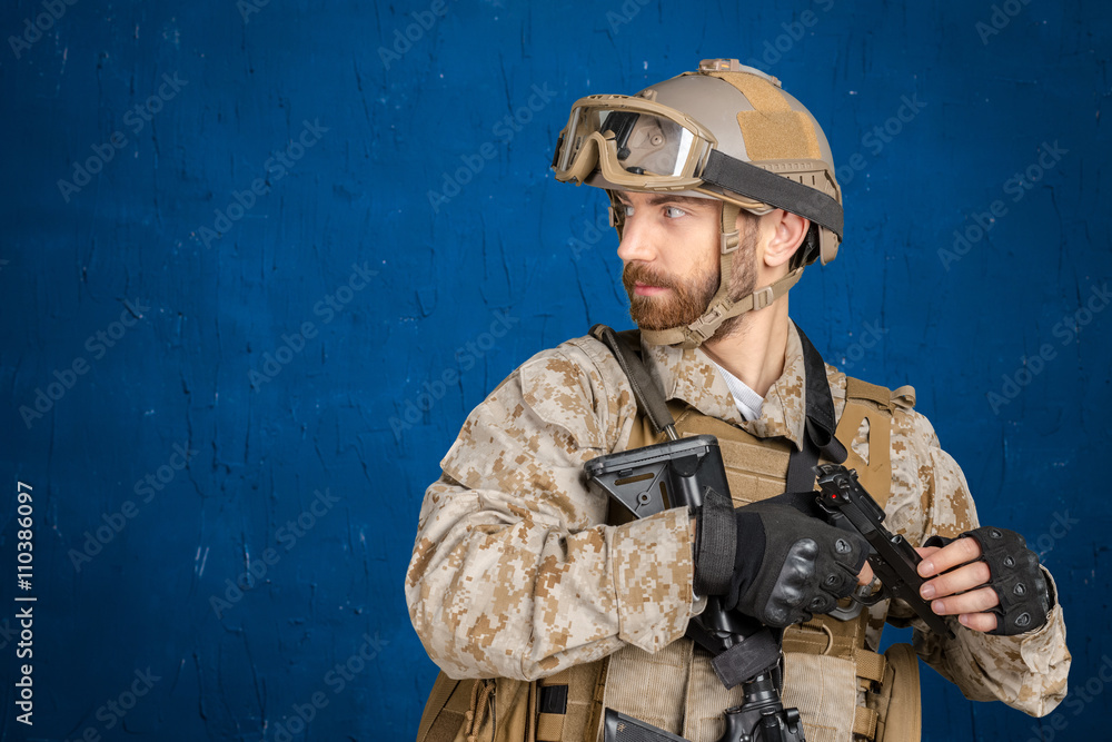Fototapeta premium Modern soldier with gun