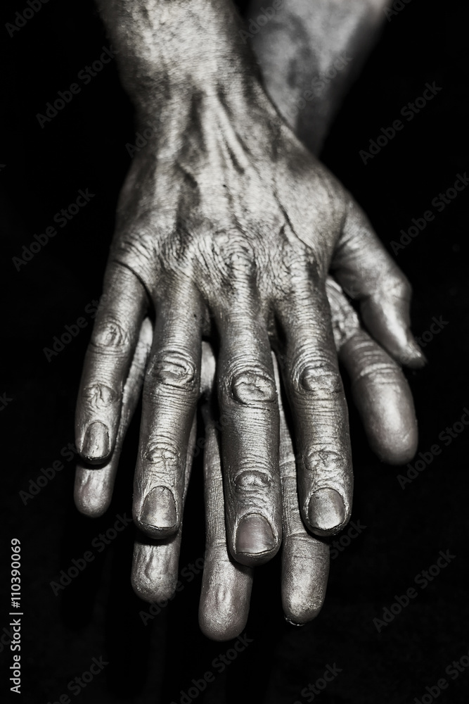 Fototapeta premium Sculptural Metal male hands