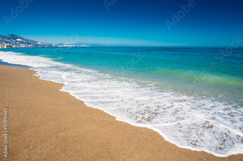 Soft Sea Ocean Waves Wash Over Golden Sand Background