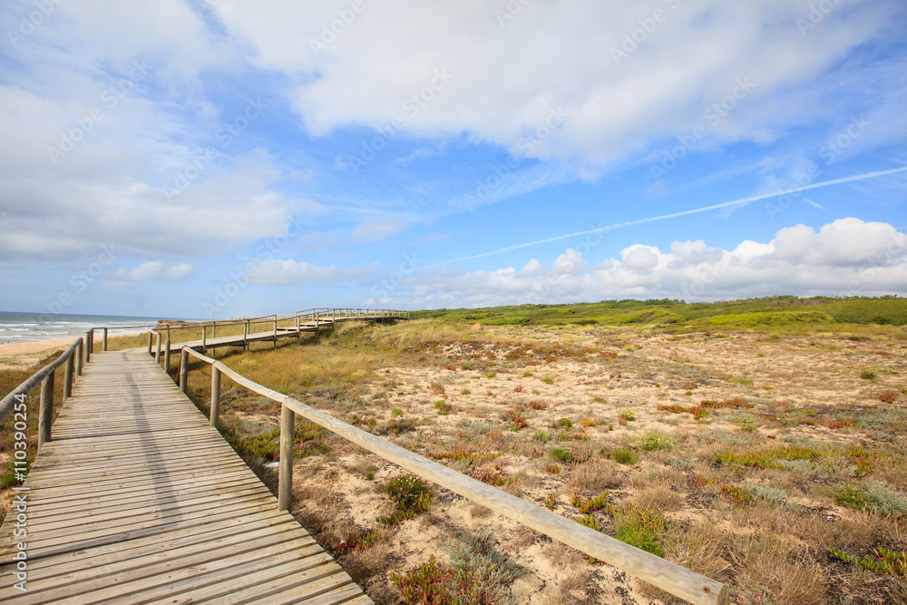 wooden walkway to the beach and ocean, Portugal