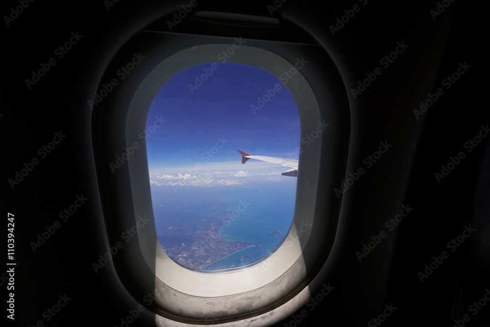 Looking through window aircraft during flight in wing with top view
Looking through window aircraft during flight in wing with top view