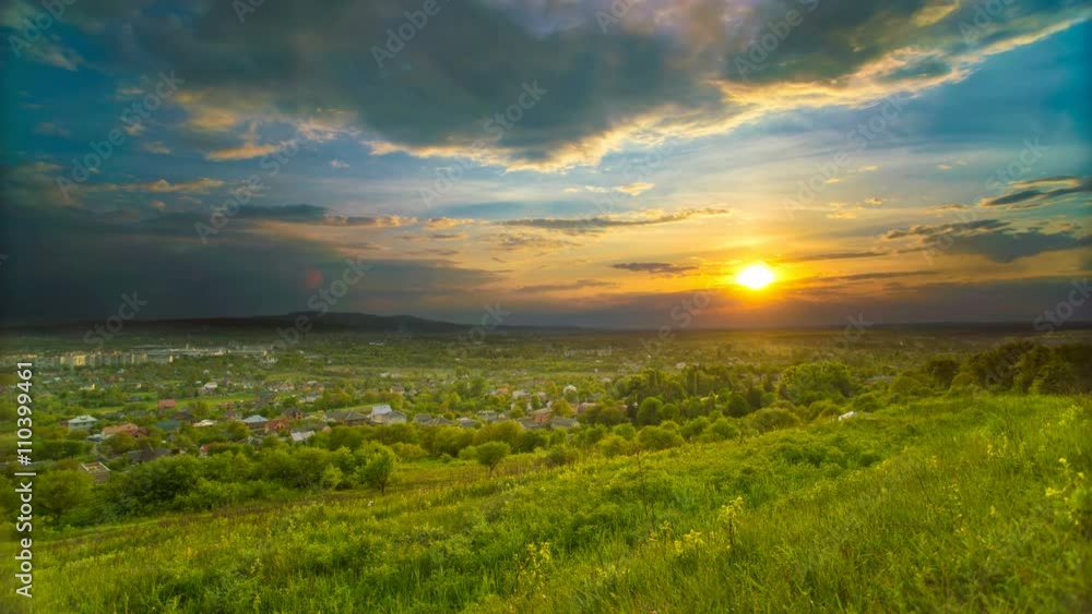 3 in 1! The flow of rain cloud over the city on the background of sunset