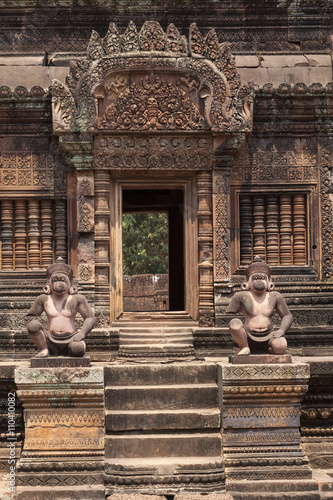 Monkey guardians in the Banteay Srey hindu khmer temple ,  Angkor Wat, Cambodia.  photo