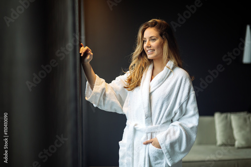 Beautiful glamorous woman in bathrobe photo