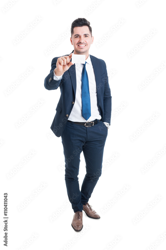 Full body of cheerful young businessman showing blank business c Full body of cheerful young businessman showing blank business c