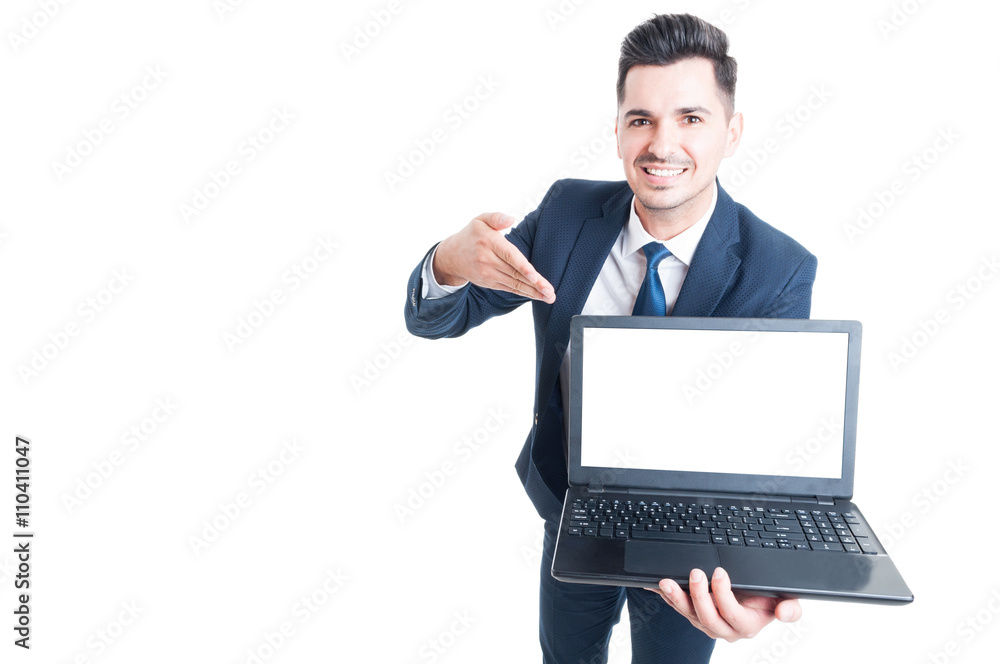 Portrait of cheerful male executive presenting a laptop Portrait of cheerful male executive presenting a laptop