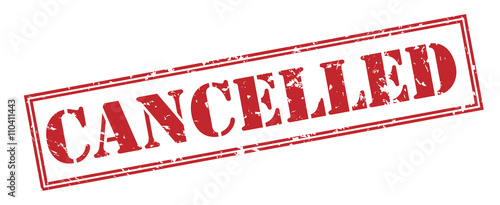 фотографія cancelled red stamp on white background