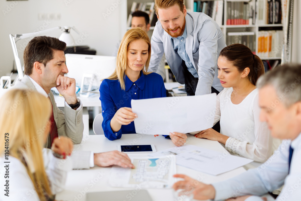 Businesspeople collaborating in office Businesspeople collaborating in office