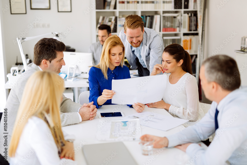 Businesspeople collaborating in office