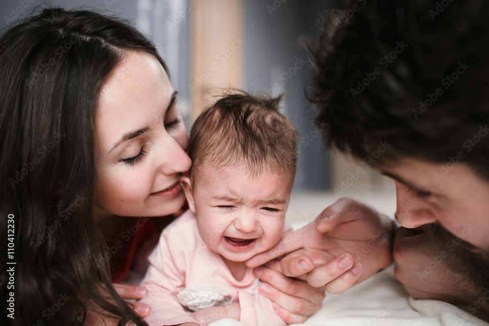 mom, dad and daughter crying mom, dad and daughter crying