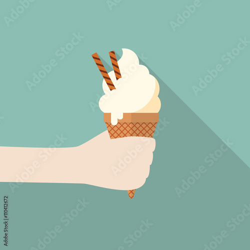 Hand with ice cream cone