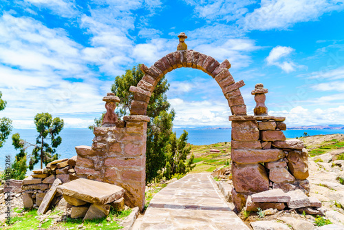 Stone arch leading to the main square of Taquile Island photo