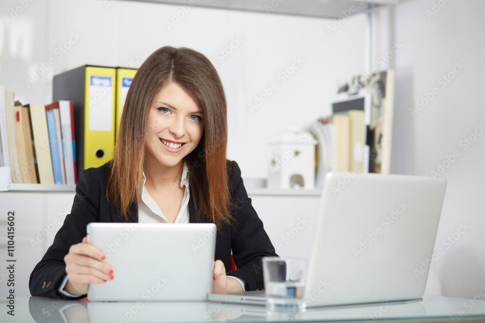 young businesswoman working in her office young businesswoman working in her office