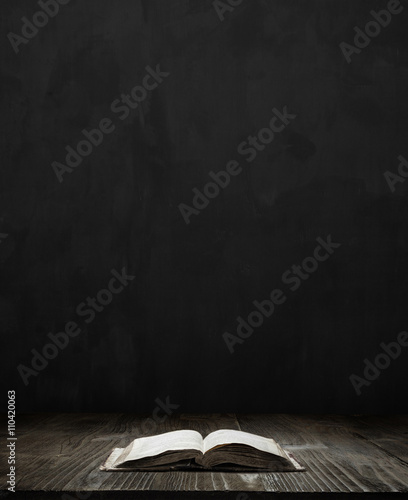 bible over dark room background