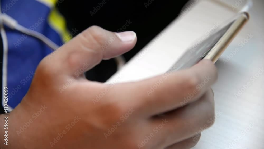 Unknown male use smartphone for play a game full HD. Unknown male use smartphone for play a game full HD.