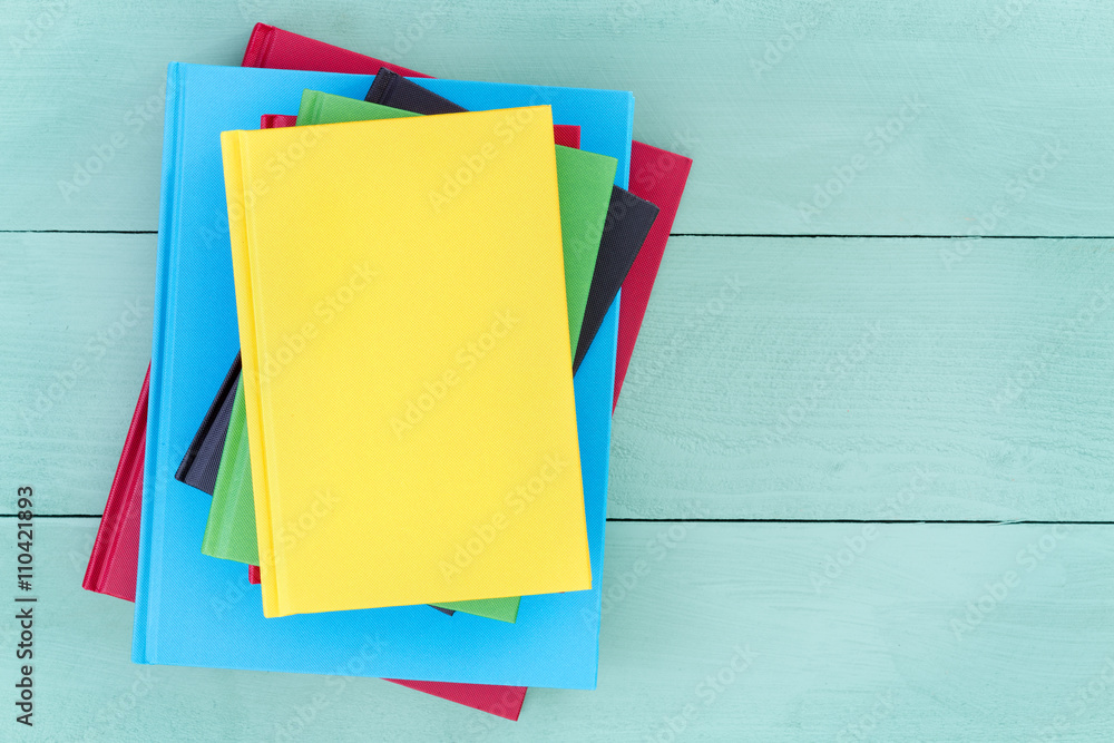 Fototapeta premium Offset stack of multicolored hardcover books