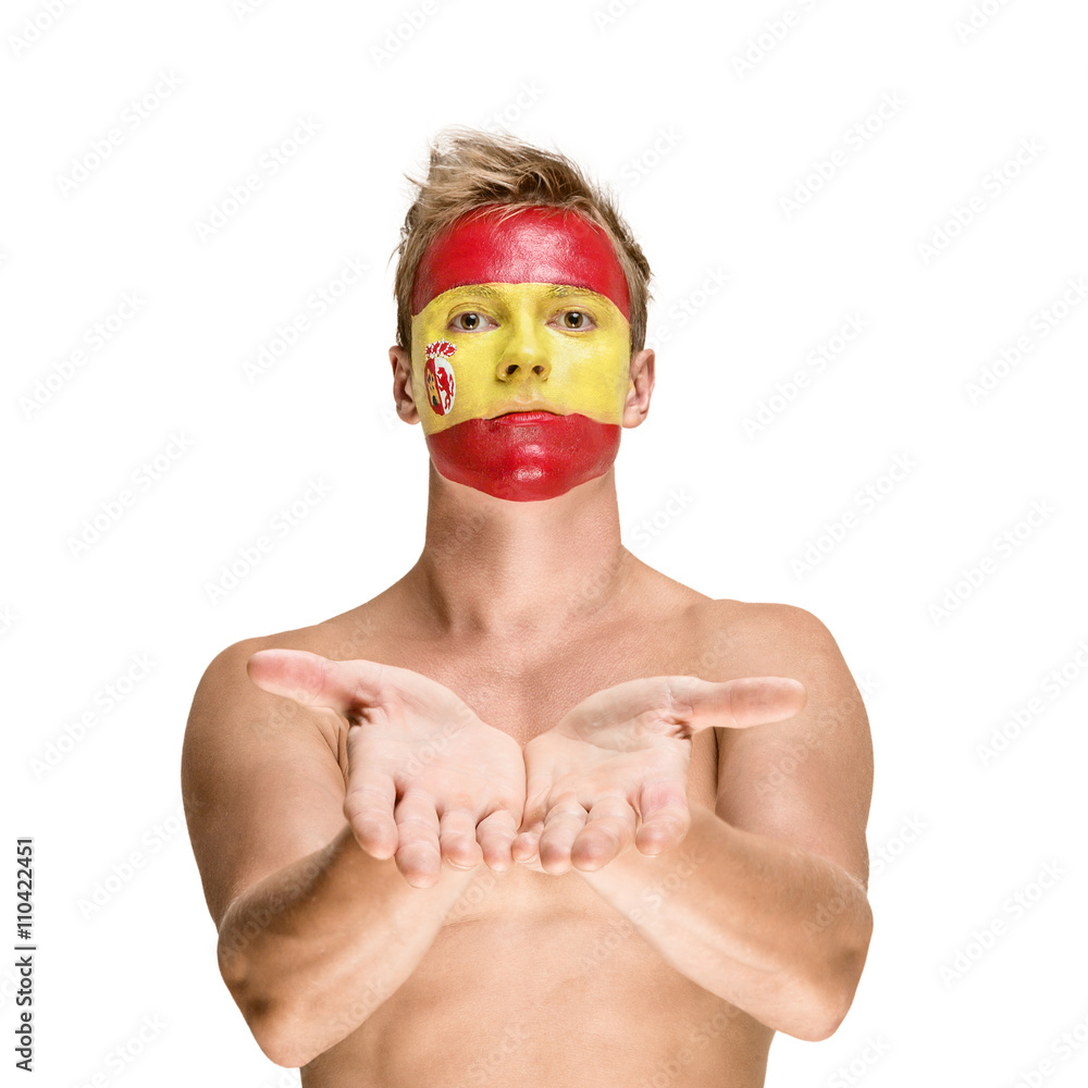 Football fan with spain flag painted over face - obrazy, fototapety, plakaty 
