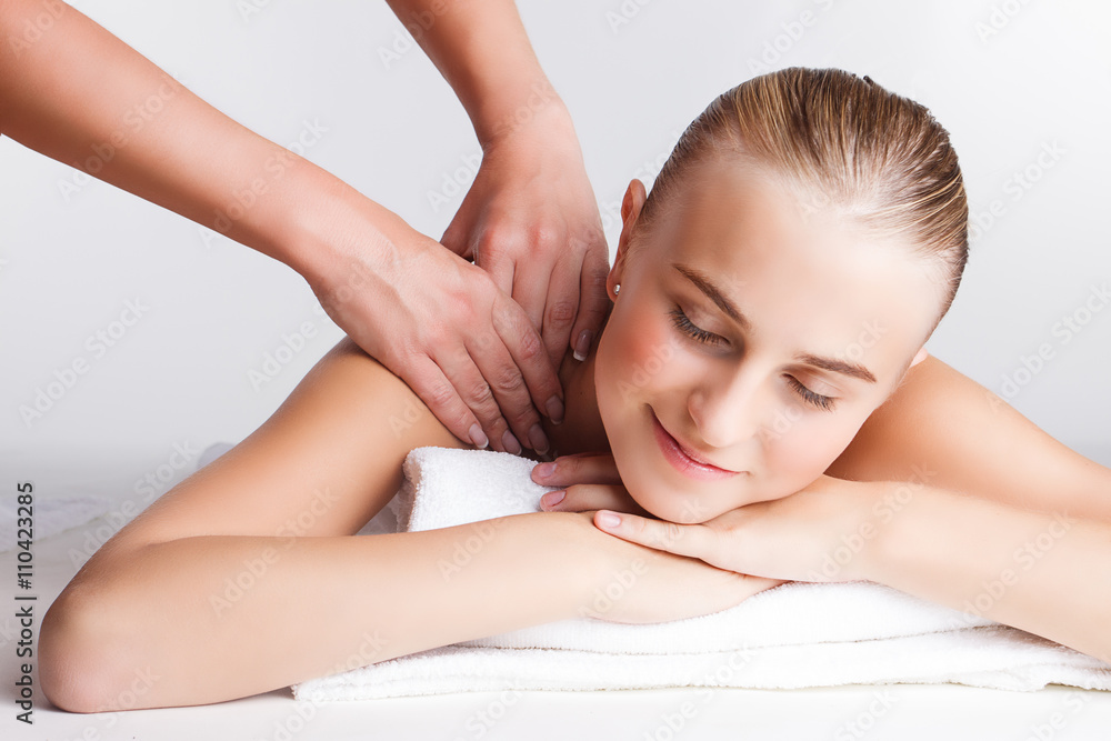beautiful girl doing massage on a white background beautiful girl doing massage on a white background