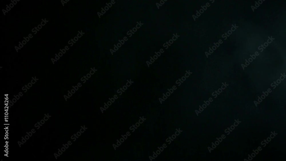 The movement of the smoke on a black background. The concept of of struggle against smoking. The movement of the smoke on a black background. The concept of of struggle against smoking.