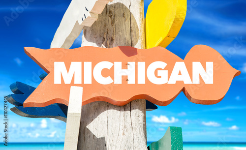 Michigan signpost with beach background