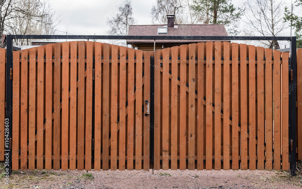 Fototapeta premium brown wooden gate in the village