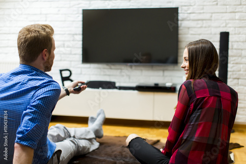 Couple watching television ...