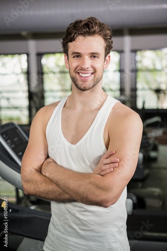 Handsome man standing in gym