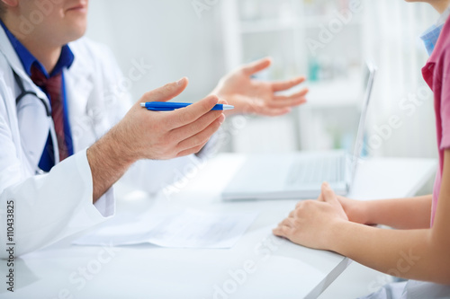 Doctor and nurse talking about medical results