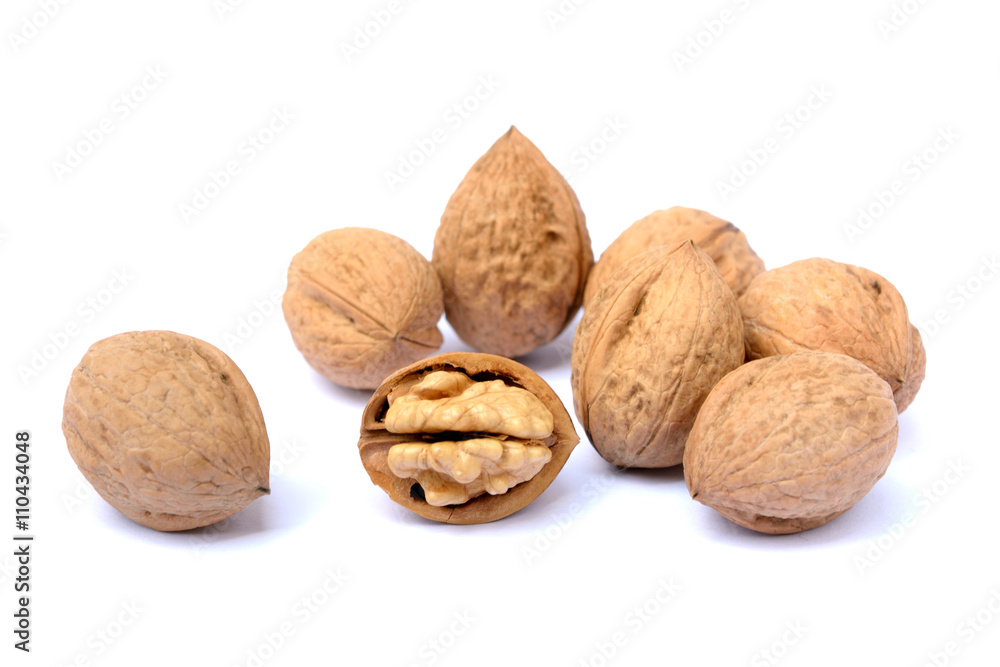 Walnuts in shell isolated on white background Walnuts in shell isolated on white background