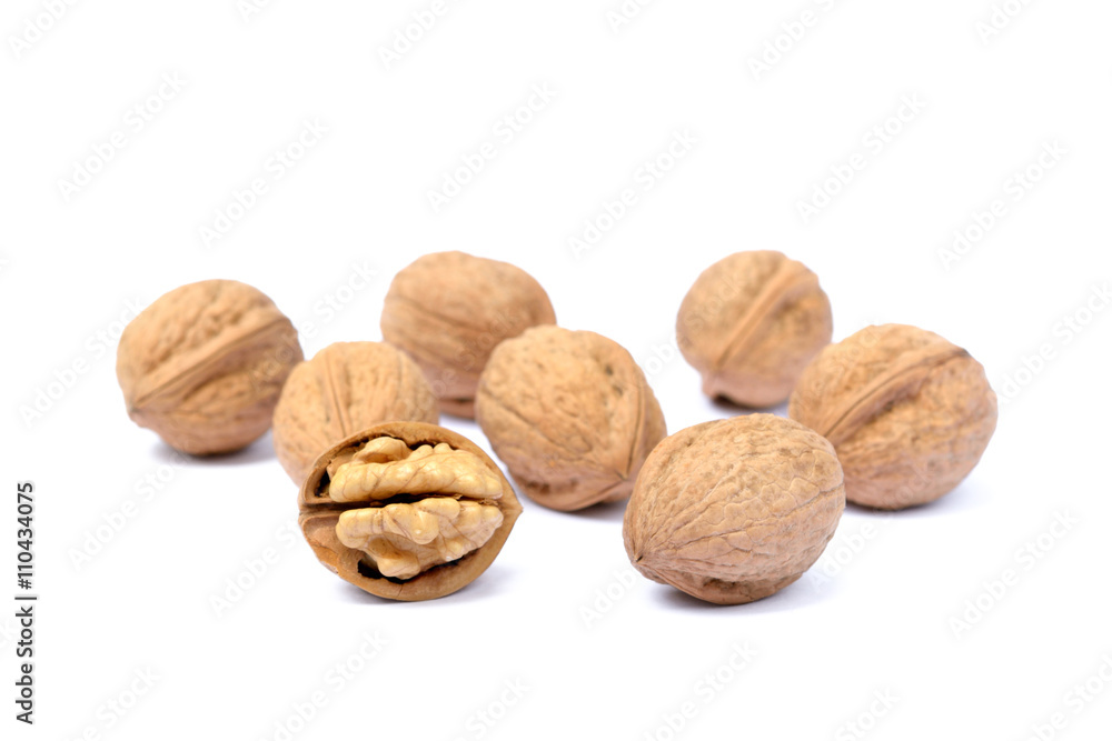 Walnuts in shell isolated on white background Walnuts in shell isolated on white background