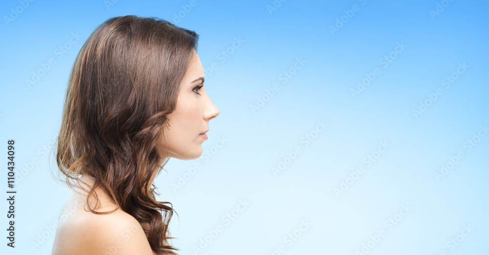 Portrait of beautiful woman, on blue Portrait of beautiful woman, on blue
