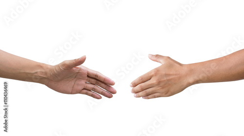 Closeup of two businessmen, lawyers or politicians shaking hands to celebrate a successful agreement with one of them holding the other hand in his pocket.
