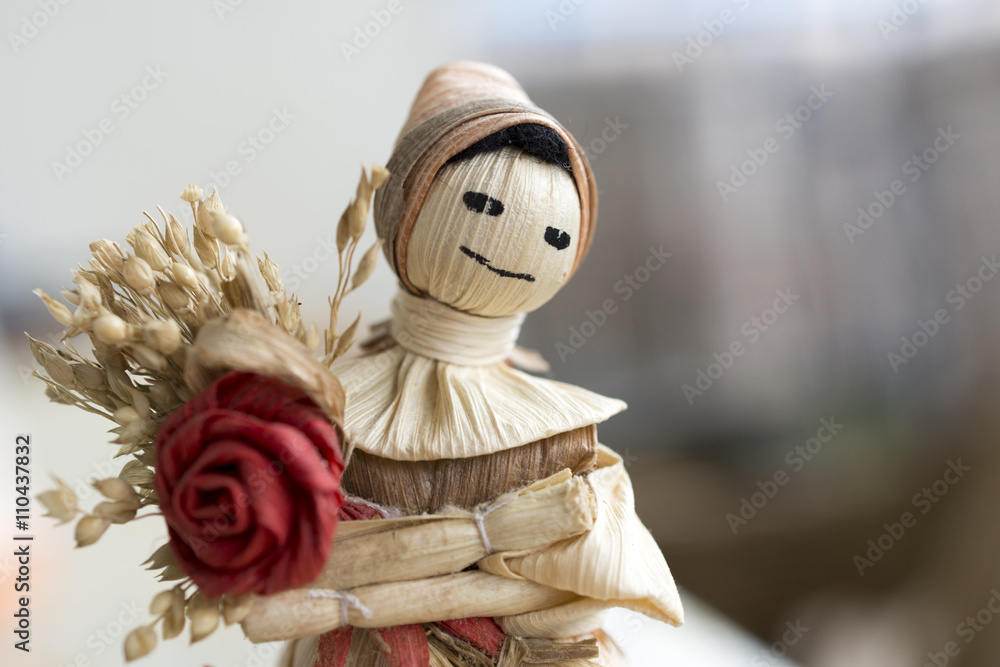 Doll with flower