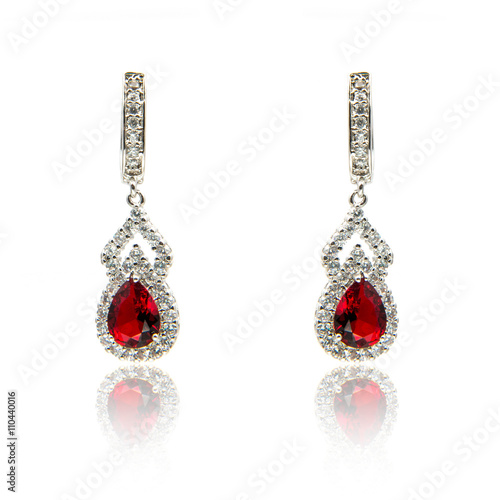 Pair of diamond earrings, isolated on white