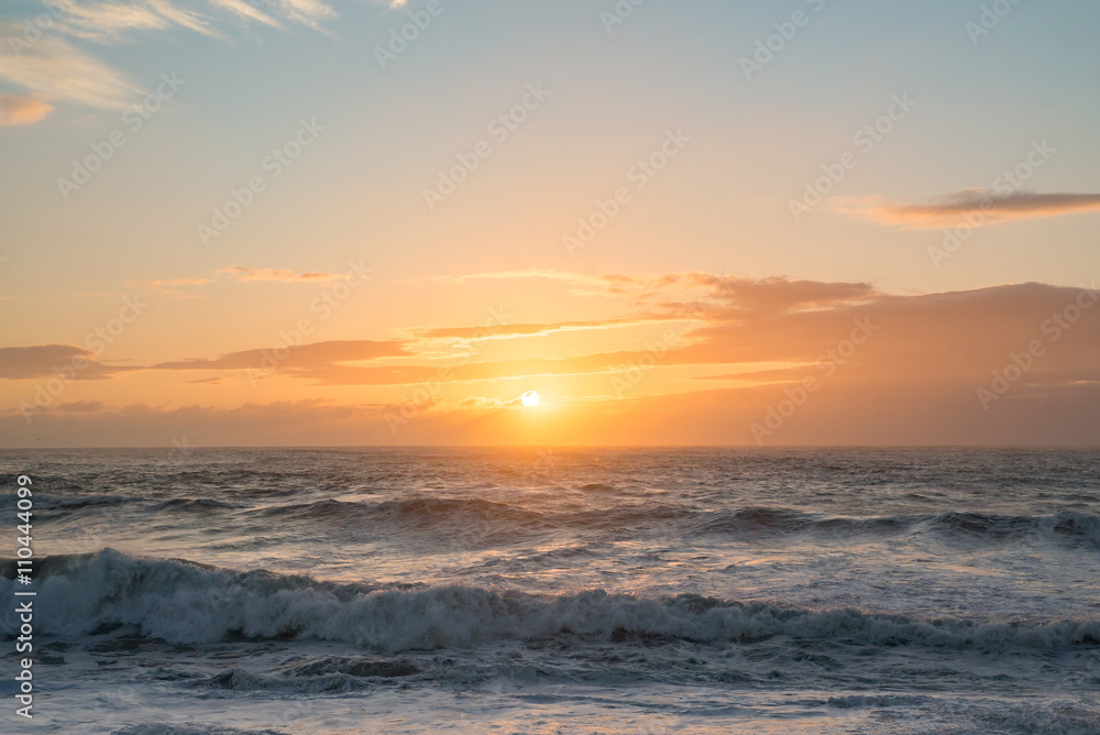 Ocean sunset blue orange rough seas waves dusk dawn sea