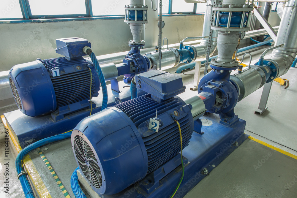 several water pumps with large motors several water pumps with large motors