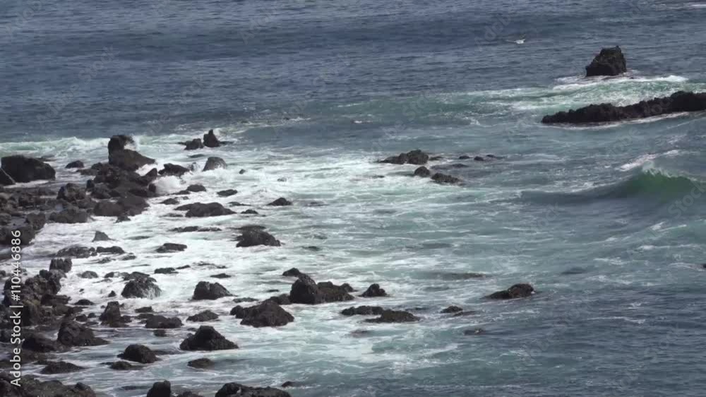 Ocean waves rushing over rocks near the shore
Ocean waves rushing over rocks near the shore
