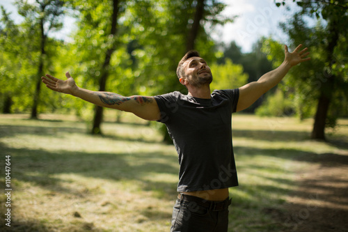 happiness. laughing man on a meadow
