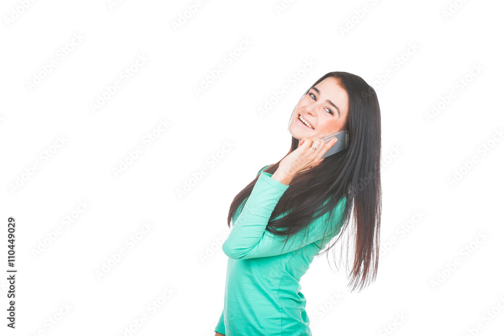 Smiling woman talking on the phone Smiling woman talking on the phone