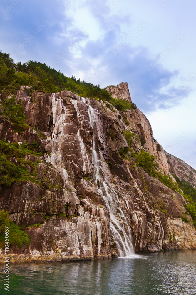 Waterfall in fjord Lysefjord - Norway