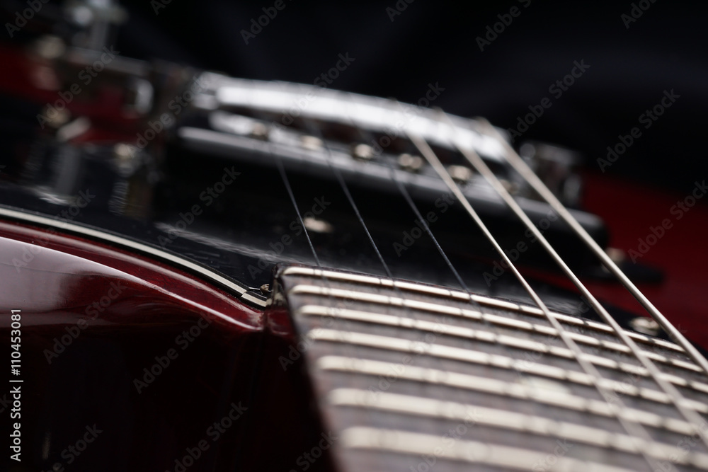 Closeup of old electric guitar. Detail, selective focus. Closeup of old electric guitar. Detail, selective focus.