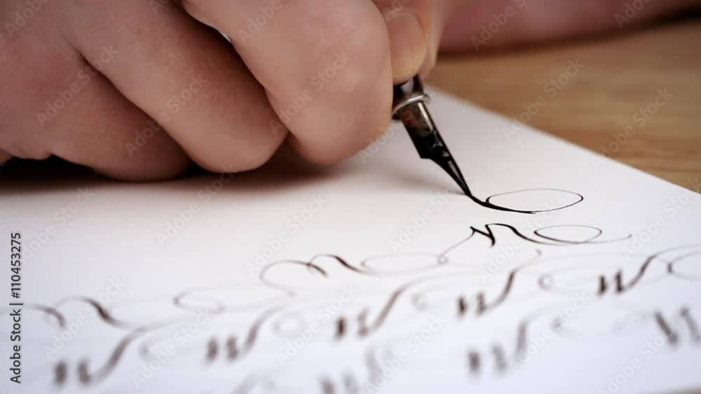 Writting letter with a pen. Calligraphy lesson. Close up. Slow motion Writting letter with a pen. Calligraphy lesson. Close up. Slow motion